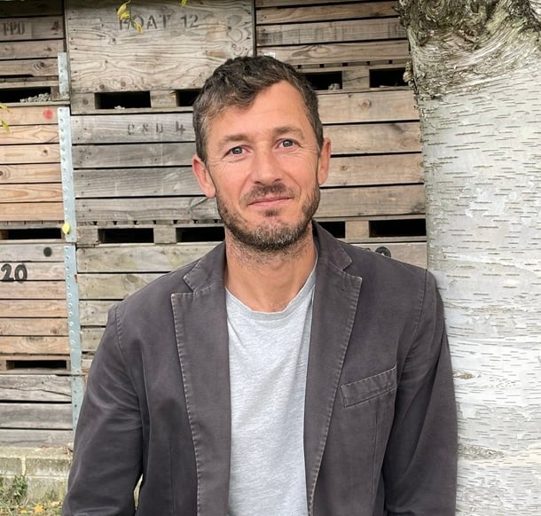 Sam Houston Managing Director of Hungry Communications on a farm